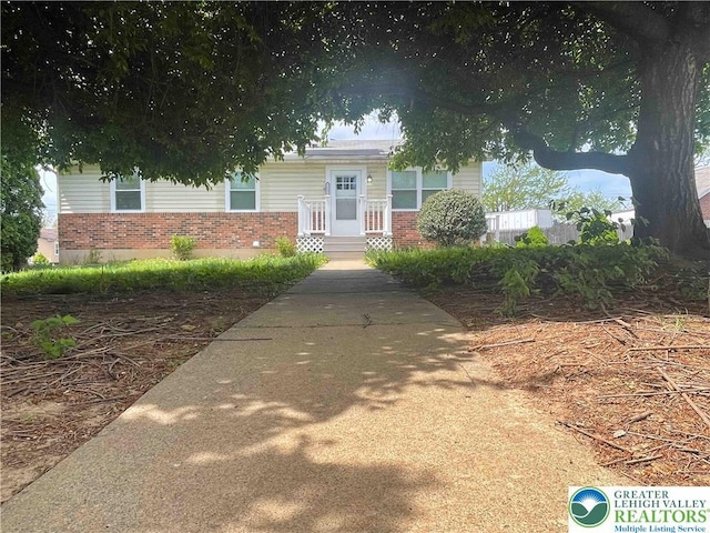 1231 Fairmount St, Bethlehem City, PA 18017 - view of front facade featuring brick siding