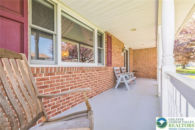 balcony featuring a porch