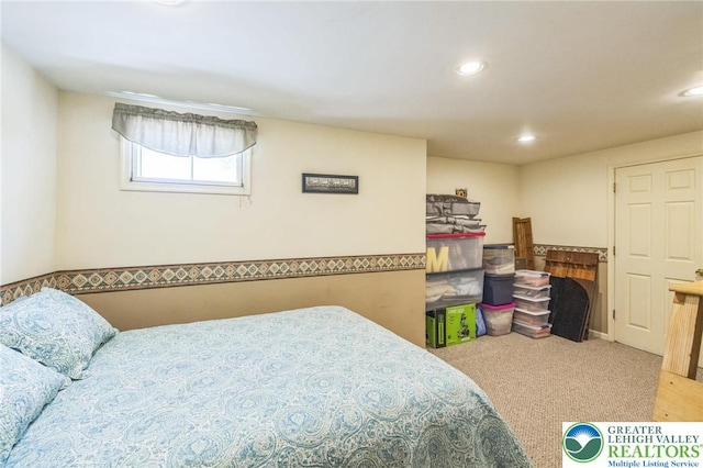 bedroom with recessed lighting and carpet floors