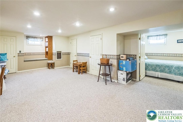 interior space featuring plenty of natural light, recessed lighting, baseboards, and carpet floors