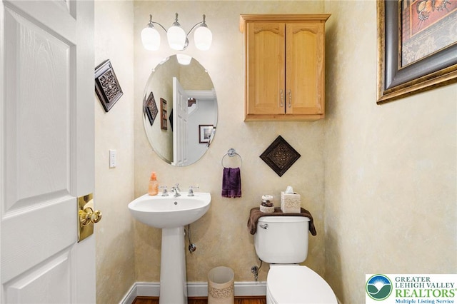 bathroom featuring toilet