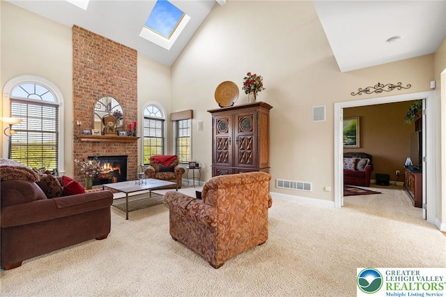 carpeted living room featuring high vaulted ceiling, visible vents, a wealth of natural light, and a fireplace