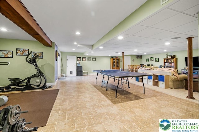 rec room featuring recessed lighting, baseboards, and ornate columns