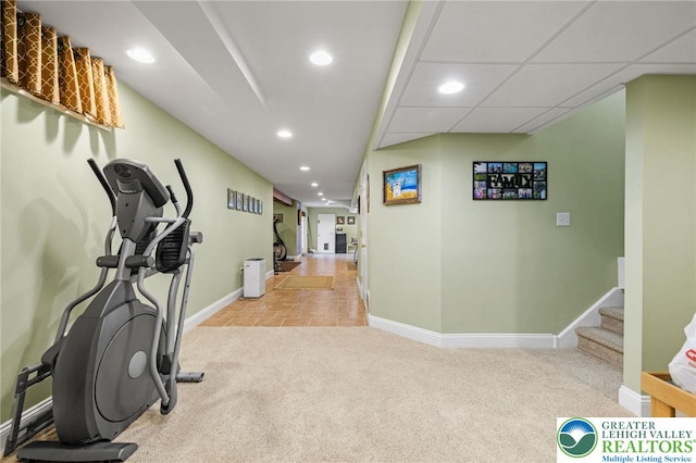 exercise area featuring carpet floors, recessed lighting, and baseboards