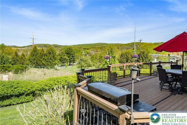 deck featuring outdoor dining space