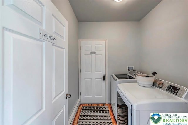 134 Altemose Rd, Tobyhanna Twp, PA 18347 - washroom with light wood-style floors, laundry area, and washer and clothes dryer