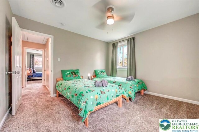 134 Altemose Rd, Tobyhanna Twp, PA 18347 - carpeted bedroom featuring baseboards, multiple windows, and attic access