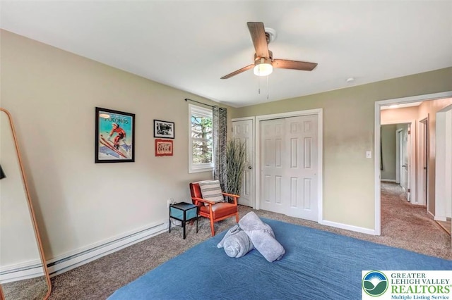 134 Altemose Rd, Tobyhanna Twp, PA 18347 - bedroom featuring carpet floors, a baseboard radiator, two closets, and ceiling fan