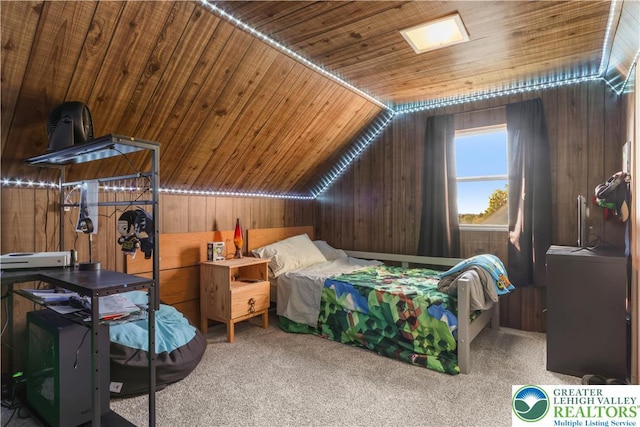 carpeted bedroom featuring wood walls, wood ceiling, and lofted ceiling