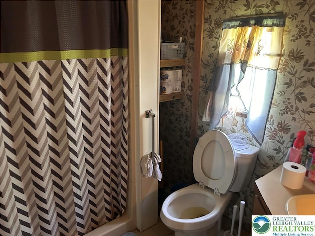 2845 Pacific Ave, North Whitehall Twp, PA 18069 - bathroom featuring a shower with curtain, wallpapered walls, and toilet