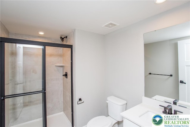 full bathroom with recessed lighting, a shower stall, toilet, and visible vents