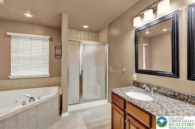 full bathroom with tile patterned flooring, vanity, a jetted tub, recessed lighting, and a shower stall