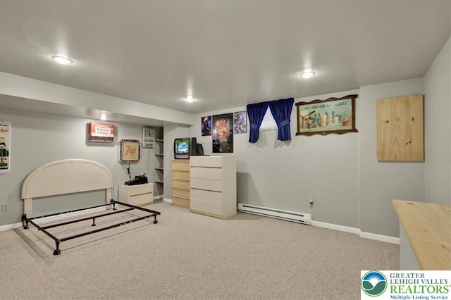 interior space with baseboards, baseboard heating, carpet flooring, and recessed lighting