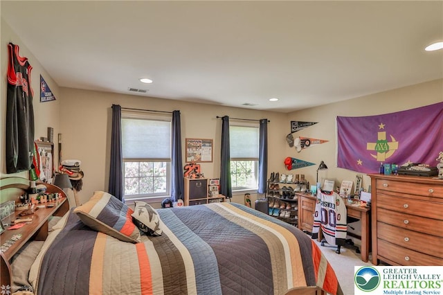 bedroom featuring visible vents, recessed lighting, and carpet