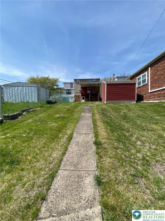 view of yard featuring fence
