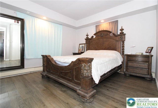 bedroom featuring dark wood-style flooring, recessed lighting, and baseboard heating