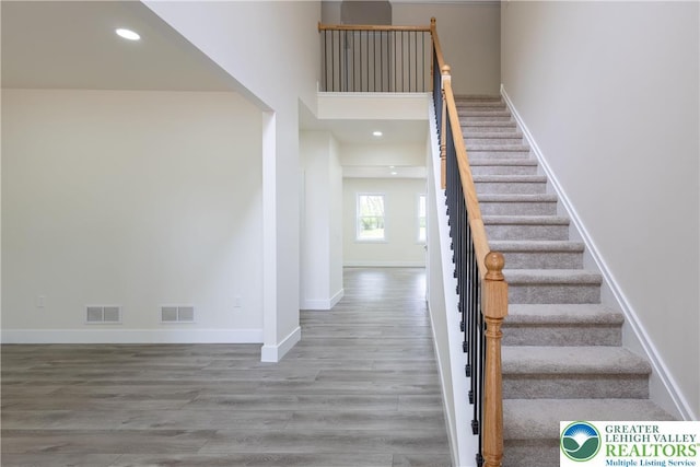 21 Piute Trl, Penn Forest Township, PA 18210 - stairway featuring wood finished floors, baseboards, and recessed lighting