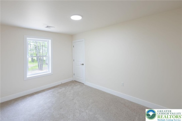 21 Piute Trl, Penn Forest Township, PA 18210 - carpeted empty room featuring baseboards