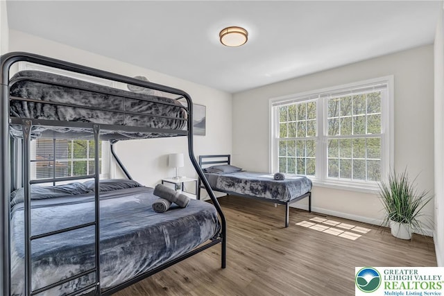 511 Lakeside Dr, Stroud Twp, PA 18301 - bedroom with baseboards and wood finished floors