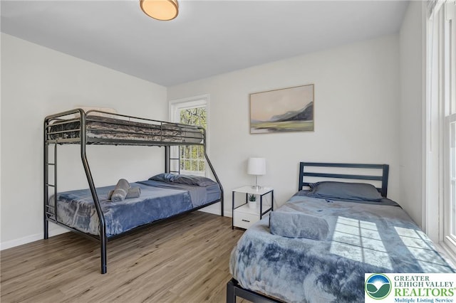511 Lakeside Dr, Stroud Twp, PA 18301 - bedroom with wood finished floors