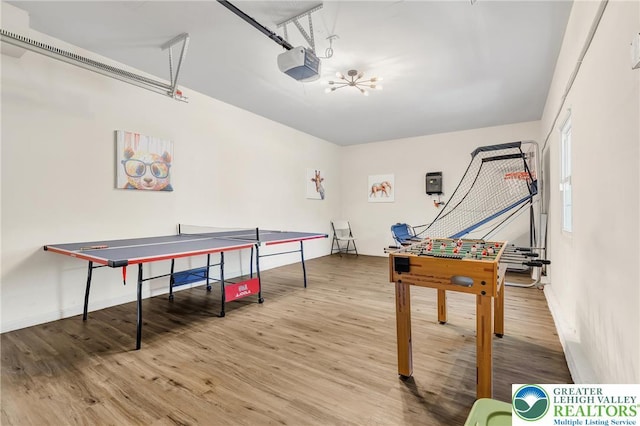 511 Lakeside Dr, Stroud Twp, PA 18301 - game room with baseboards and wood finished floors