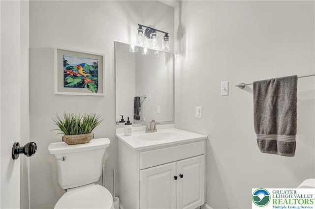511 Lakeside Dr, Stroud Twp, PA 18301 - bathroom featuring vanity and toilet