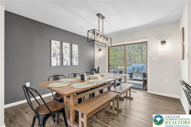 511 Lakeside Dr, Stroud Twp, PA 18301 - dining space with baseboards and wood finished floors