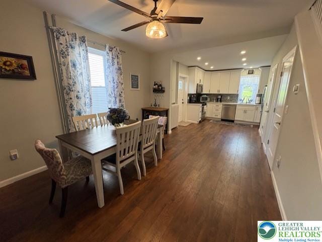 dining space with baseboards, a ceiling fan, dark wood-style floors, and recessed lighting