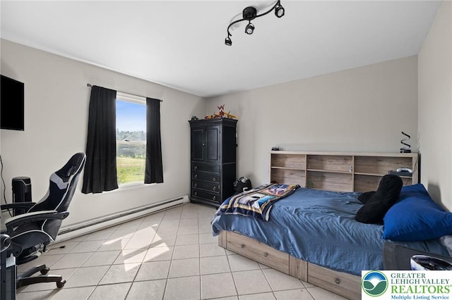 bedroom featuring light tile patterned flooring and a baseboard radiator