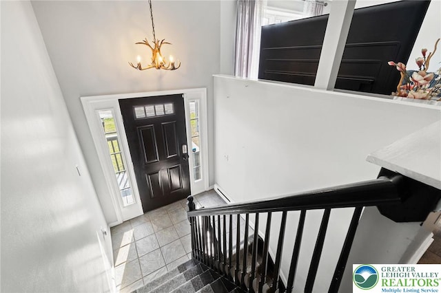 foyer featuring a notable chandelier