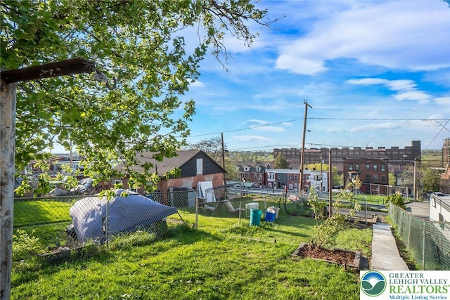 view of yard featuring fence