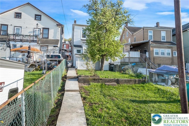 view of property's community with fence