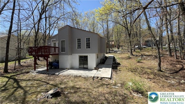 194 Murphy Cir, Lehman Twp, PA 18324 - view of side of home featuring a patio and a deck