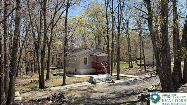 194 Murphy Cir, Lehman Twp, PA 18324 - view of yard featuring a wooded view