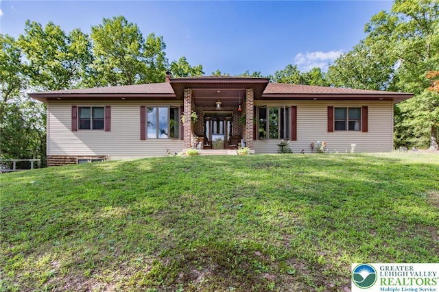 view of front of house with a front lawn