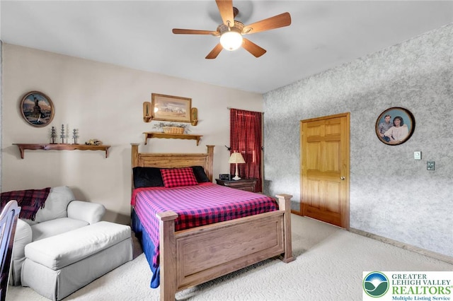 bedroom featuring carpet flooring and a ceiling fan