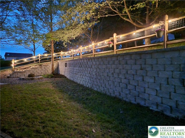 view of yard with a fenced backyard