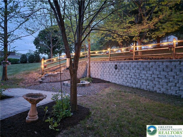view of yard with fence and a patio area