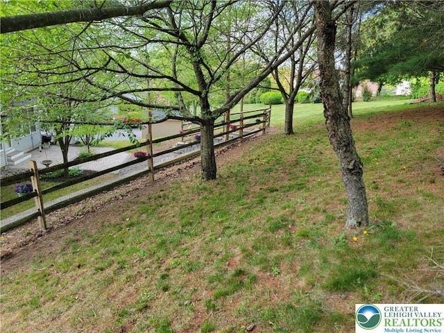 view of yard with fence