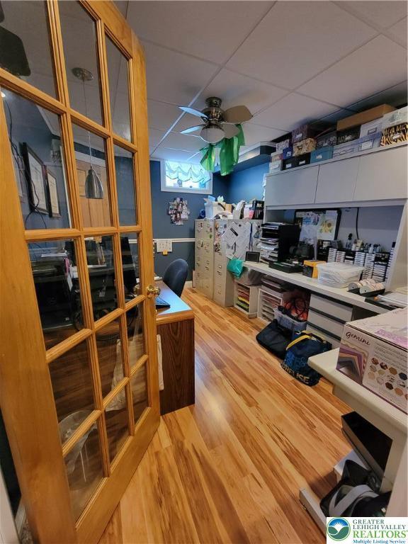 storage room featuring ceiling fan