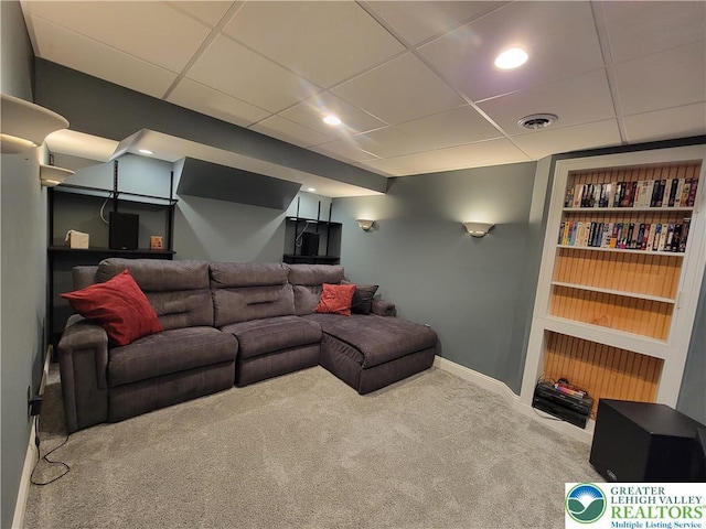 living area with visible vents, a paneled ceiling, baseboards, carpet, and recessed lighting