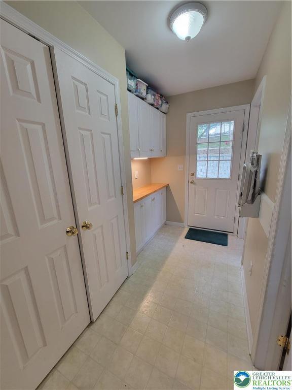 interior space with baseboards
