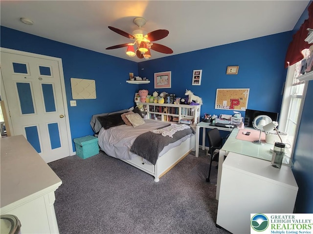 bedroom featuring carpet and a ceiling fan