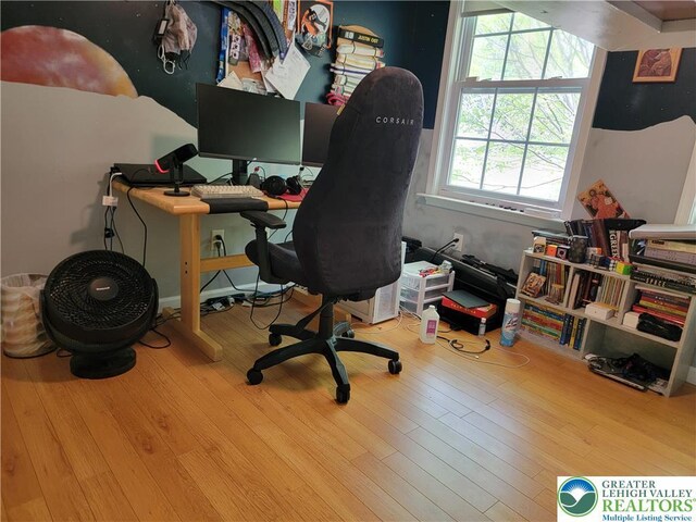 office area with wood finished floors