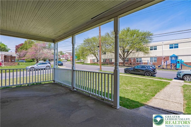 view of patio / terrace featuring covered porch and a residential view