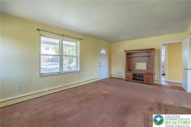 unfurnished living room with a baseboard radiator, carpet floors, and baseboards