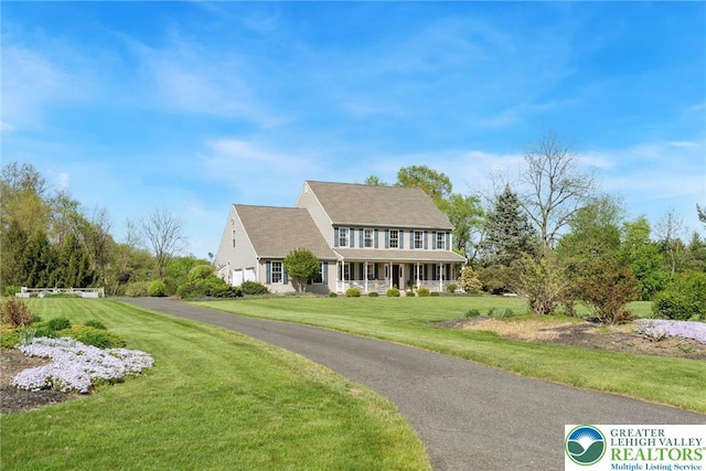 2735 Limeport Rd, Milford Twp, PA 18951 - colonial-style house featuring a front lawn