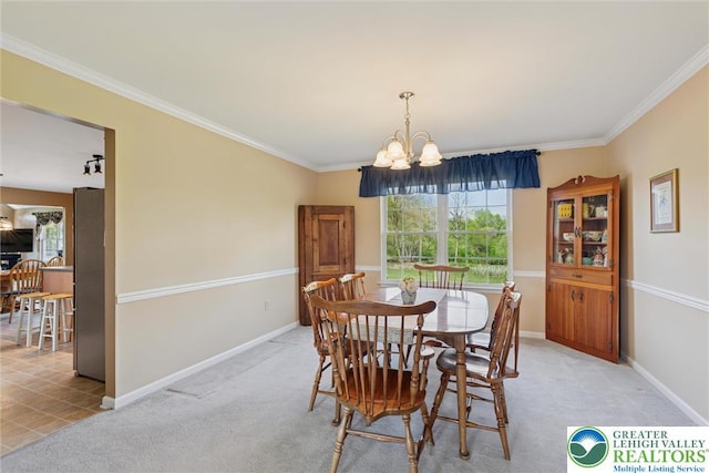 2735 Limeport Rd, Milford Twp, PA 18951 - dining space featuring a wealth of natural light, ornamental molding, an inviting chandelier, and light colored carpet