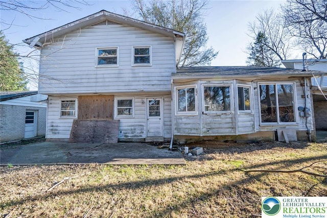 back of house featuring a patio