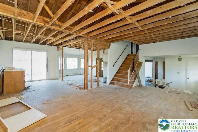 misc room with stairs